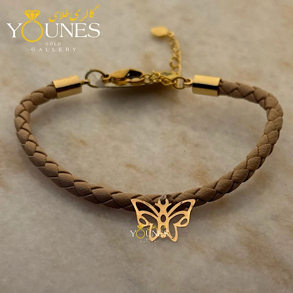 دستبند چرم کرمی پروانه لیزری طلا